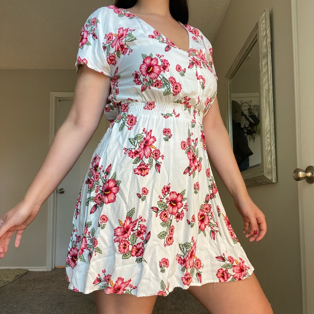 H&M floral dress; white mini dress with pink hydrangeas; breathable fabric.